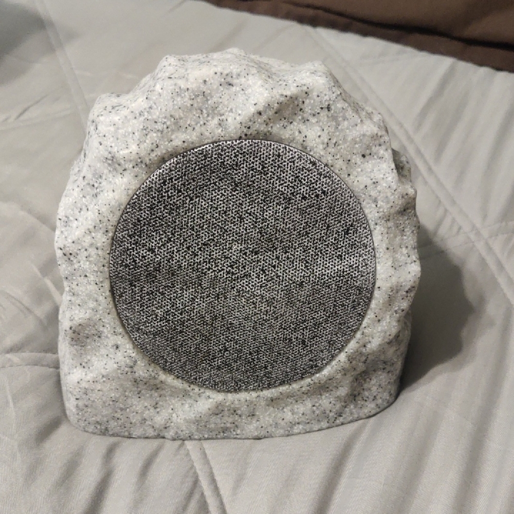 Gray Stone Sculpture with Modern Audio Fusion